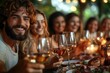 © Ida - Smiling man with friends enjoying a dinner with wine
