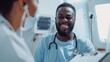 © LukaszDesign - Cardiologist and patient during a health checkup, focusing on heart evaluation and medical care with a stethoscope