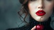 © Jumaria - Close-up of a woman's face with red lips, holding a single cherry.