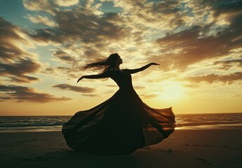 Wall Mural - elegant woman standing on a rocky shore and looking at the beautiful sea at sunset