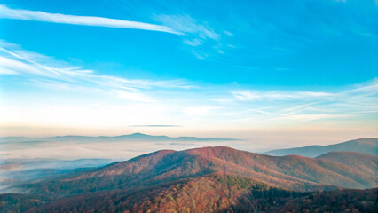 Wall Mural - Mountain sunset landscape with clouds and greenery1