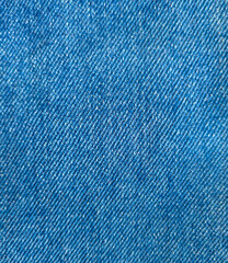 blue jeans Close-up photo of blue bright denim fabric prominent denim texture suitable for clothing feel the material