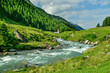 © Westend61 - River of Ahr near Zillertal Alps with chapel in Rieserferner group mountain range under cloudy sky, Italy