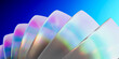 © Westend61 - 3D render of multi colored shiny crystals against blue background