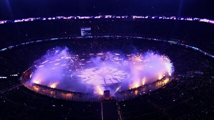 Poster - Exciting spectacle at the arena featuring stunning light displays and performances