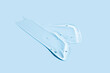 © ADDICTIVE STOCK - Cream and gel cosmetic smear on blue background