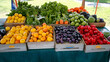 © mahamad - A fresh market brimming with fruits and vegetables.