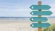 © Nattapol - Exploring directions wooden signpost at beach coastal landscape
