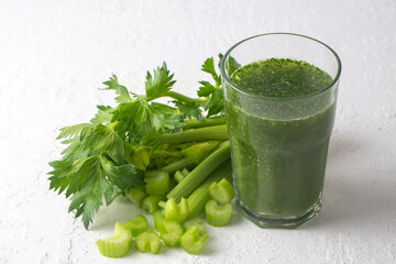 Wall Mural - A glass of green celery juice - celery smoothie.