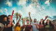 © Davide Angelini - Group of friends enjoying party throwing confetti in the air - Multicultural young students having fun celebrating and laughing out loud outdoors - Youth, friendship and summertime concept