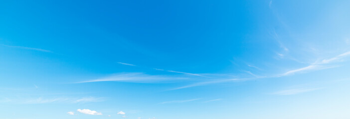 Wall Mural - small white clouds and blue sky