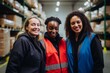 © NikoG - Smiling portrait of a diverse group of female warehouse workers
