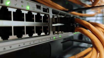 Wall Mural - close-up lights blinking on cloud computing system in server room.