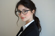 © Jan - Portrait of a young business woman with glasses on neutral background