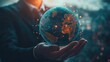 © afif - Businessman holding digital globe, global network concept.