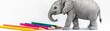 © MAGIC - A baby elephant with crayons, happily drawing on paper, depicted in a watercolor style.