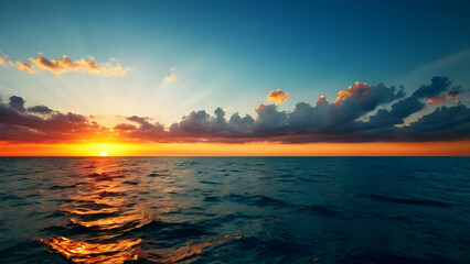 Wall Mural - Glowing sunset over the horizon, creating a warm and peaceful summer seascape.