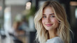© Infinity Lens - Beautiful young lady or woman with blonde hair at the hairdresser or hairstyling studio, female barber client, grooming saloon, youthful girl smiling, beautician profession treatment customer.