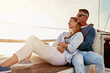 © peopleimages.com - Hug, love and travel with mature couple on yacht together with celebration, anniversary and luxury cruise. Summer, freedom and romance with man and woman on sailboat for holiday, vacation or trip