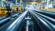 © WITTAYA  ANGMUJCHA - A busy water pipe production line with industrial machines molding, cutting, and coating pipes, ensuring precise measurements for residential and industrial use.