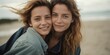 © Mountains Hunter - Two young women in love hugging on the beach, close-up portrait of lesbians. Generative AI.