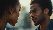 © P.G - A close-up shot of a couple during a disagreement, with one person turning away and the other speaking passionately