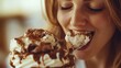 © Pichapob - Close-Up of Woman Enjoying Dessert with Spoon and Creamy Toppings