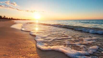 Wall Mural - tranquil sunset over serene beach with gentle waves lapping the shore and a beautiful sky in vibrant