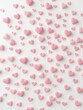 © dadtophoto - Soft, pastel pink hearts scattered on a white background, creating a delicate and romantic Valentine's Day pattern, design, cute, holiday