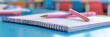 © Anat art - Brightly colored classroom with a notebook and pink pens waiting for creative writing and learning activities. Generative AI