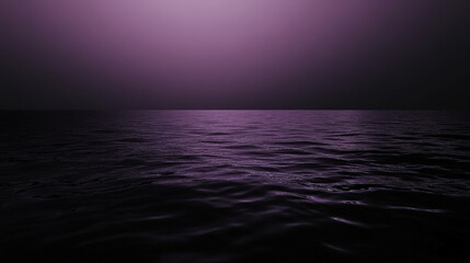 Wall Mural - A dark ocean with a purple sky in the background