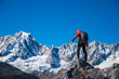 © lzf - Backpacking woman hiking on high altitude mountain top
