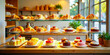 © Urenus Photos - A Delectable Display of Freshly Baked Croissants and Exquisite Pastries on a Glass Shelf