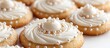 © NFTNexus - Festive butter cookies decorated with icing and sugar pearls on a white backdrop close up for holiday celebrations and baking inspiration.