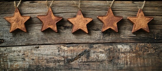 Canvas Print - Cinnamon stars arranged on rustic wooden surface ideal for holiday decorations and seasonal themes