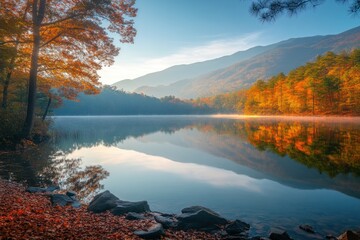 Poster - Serene autumn landscape reflecting vibrant foliage in a calm lake.