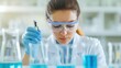 © GreenMOM - A focused scientist in a lab while conducting experiments and analyzing results in a modern laboratory setting.