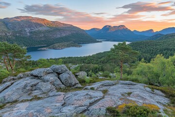 Poster - Serene landscape at sunset featuring mountains, a lake, and lush greenery.