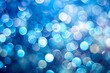 © Yauhen - Abstract bokeh effect with soft circles of light in cool blue tones, blurred and dreamy