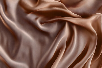 Sticker - Elegant smooth brown satin fabric with rich texture and flowing drapes in color of the year 2025 mocha mousse