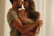 © Jacob Lund - Intimate couple embracing by the window light