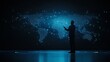 © Star - Silhouette of a person gesturing at a glowing digital world map projection.
