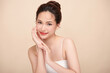 © kitthanes - Beautiful young asian woman with clean fresh skin on beige background, Face care, Facial treatment, Cosmetology, beauty and spa, Asian women portrait.
