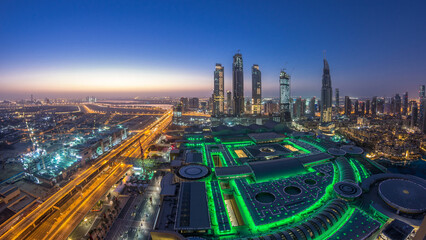 Wall Mural - Dubai downtown night to day timelapse. Top view from above