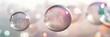 © jahanzaib - Detailed magnified view of transparent soap bubbles with rainbow reflections