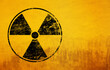 © breakingthewalls - Black radioactive sign over yellow background