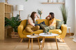 © ADDICTIVE STOCK - Cozy moment with a lesbian couple at home in a relaxed setting