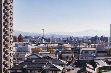 Wall Mural - 冬の霞んだ山と街並み　松本市