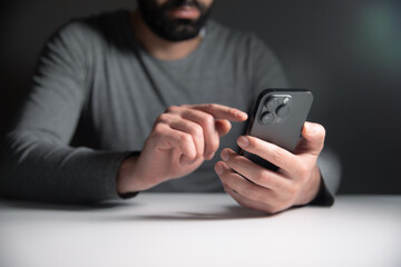 Wall Mural - man holding a mobile phone