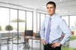 © BillionPhotos.com - Happy business man looking at camera posing